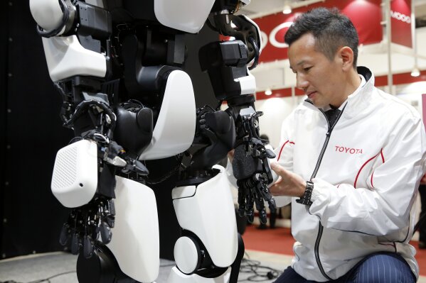 Toyota unveils upgraded version of its humanoid robot AP News